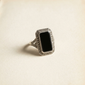 Art Deco marcasite and onyx cocktail ring on paper